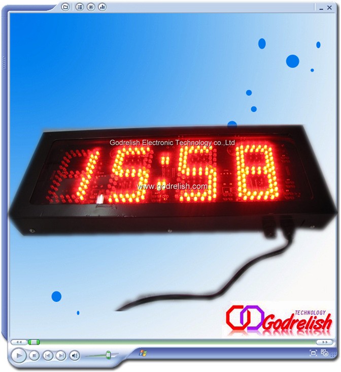 small outdoor red digital clock